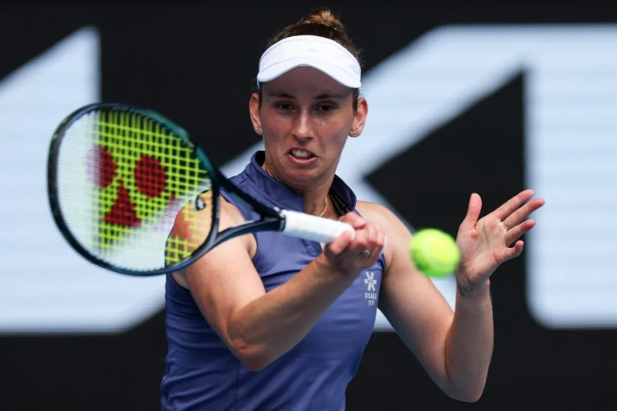 Belgium's Elise Mertens hits a return against USA's Jessica Pegula during their women's singles match on day four of the Australian Open tennis tournament in Melbourne on January 15, 2025.  Adrian DENNIS / AFP