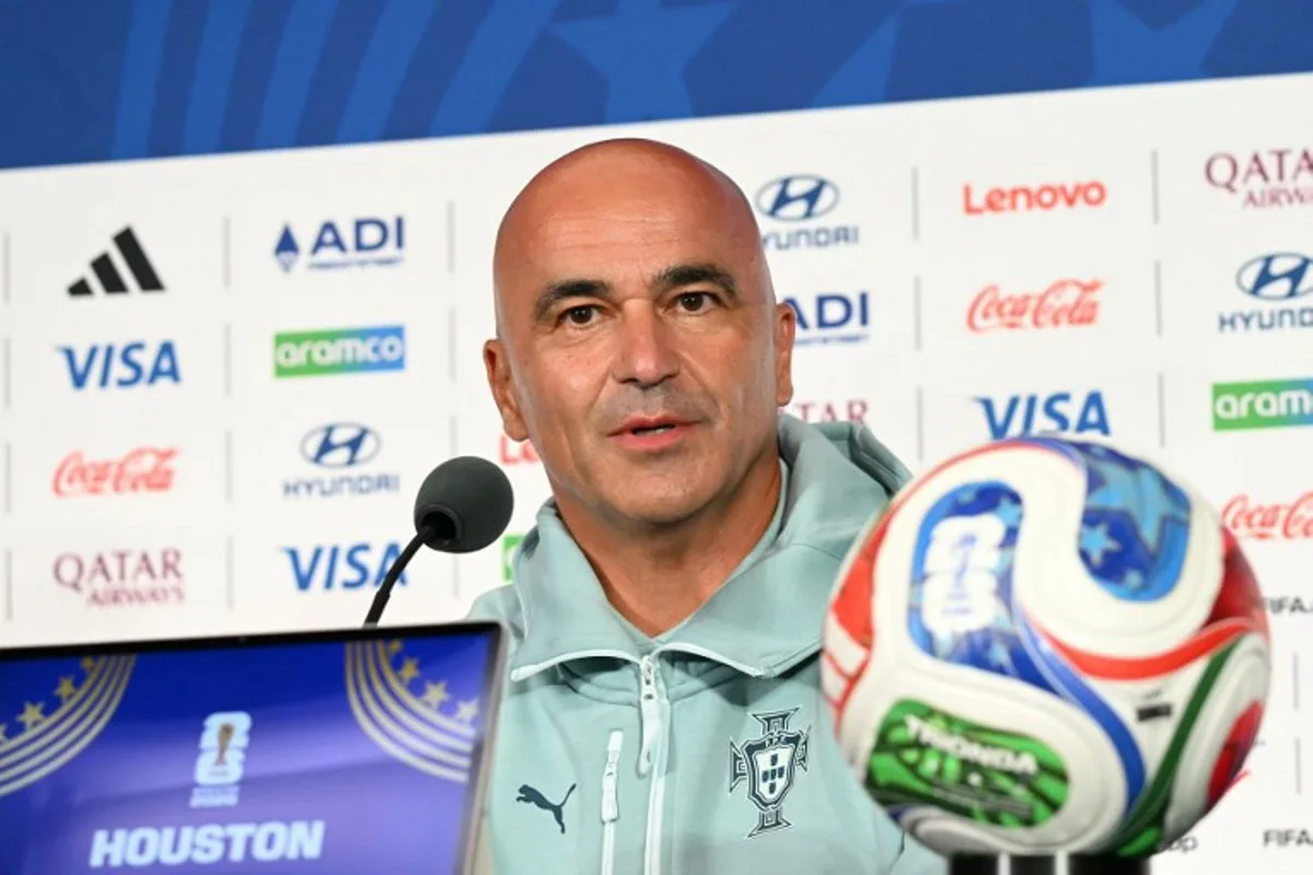Portugal's Spanish head coach Roberto Martinez gives an MD-1 press conference at the Houston Stadium in Houston on June 16, 2026, on the eve of the 2026 World Cup Group K football match between Portugal and Congo DR. RONALDO SCHEMIDT / AFP