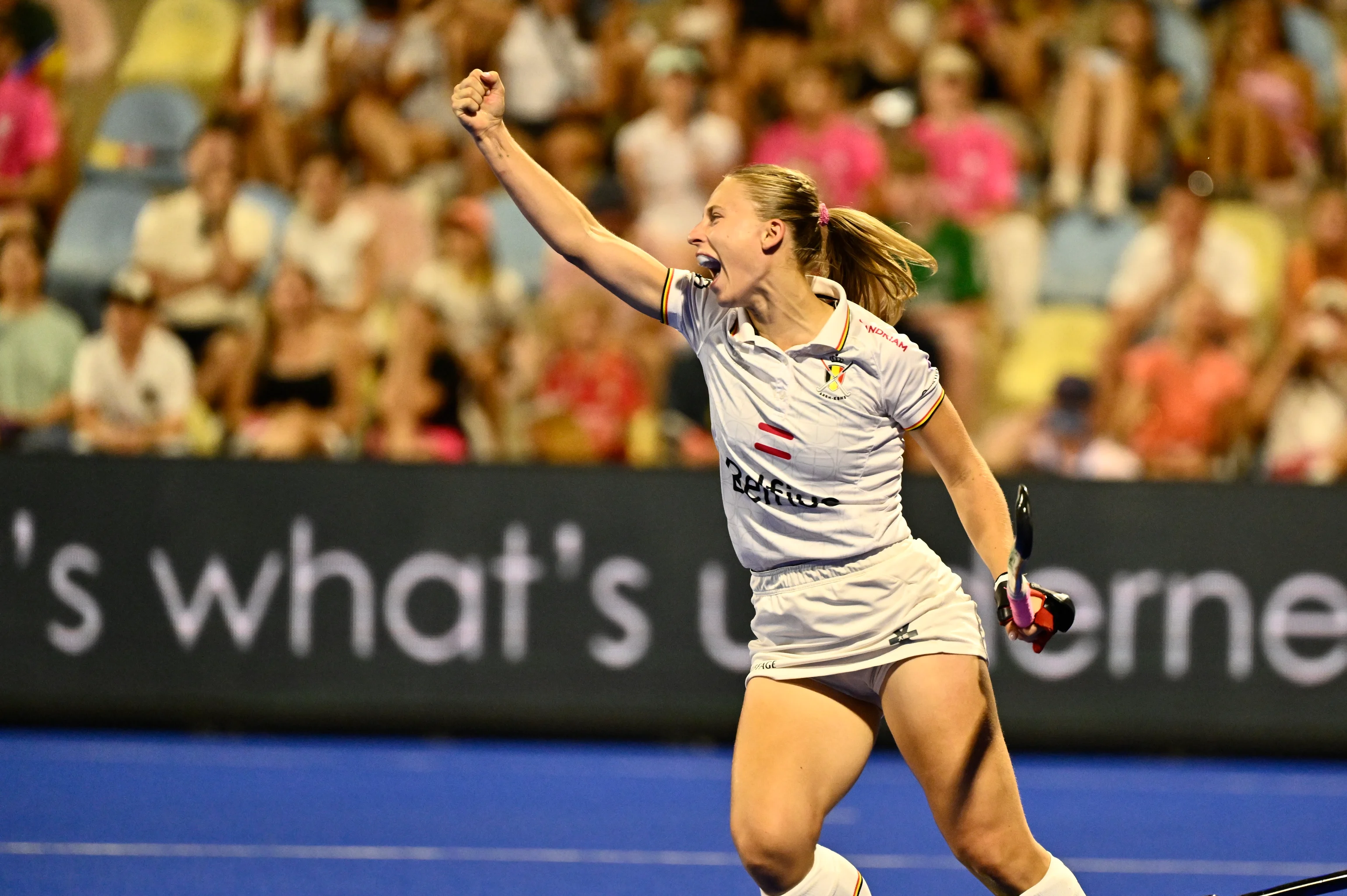 Belgium's Justine Rasir celebrates at a hockey game between Germany and the Belgian national team Red Panthers, the semi-finals of the 2025 women's European championships, Friday 15 August 2025 in Monchengladbach, Germany.  BELGA PHOTO ERIC LALMAND