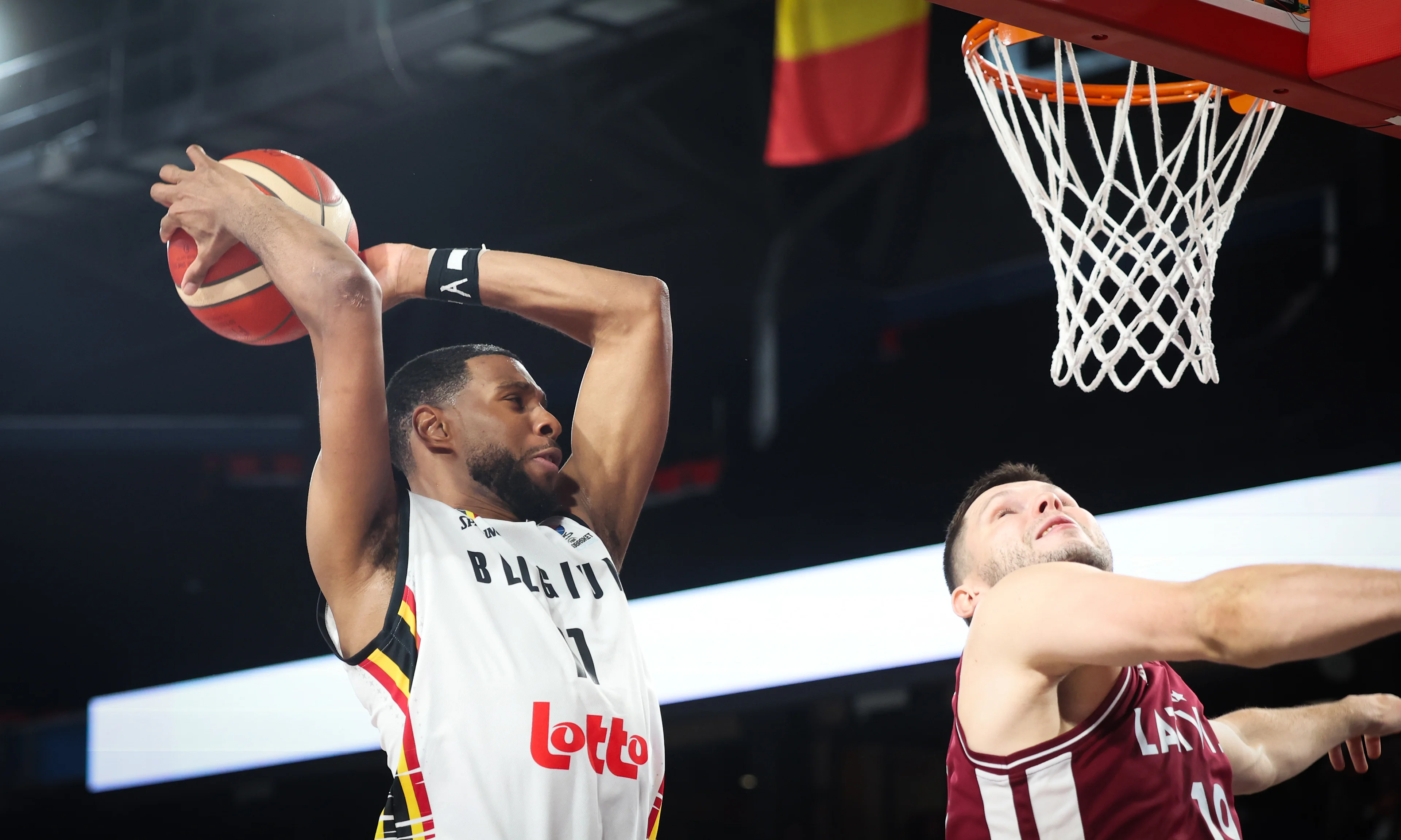 Belgium's Loic Schwartz fights for the ball during a basketball match between Belgium's national team Belgian Lions and Latvia, Monday 25 November 2024 in Charleroi, game 4/6 in the group stage of the qualifications for the Eurobasket 2025 European championships. BELGA PHOTO VIRGINIE LEFOUR