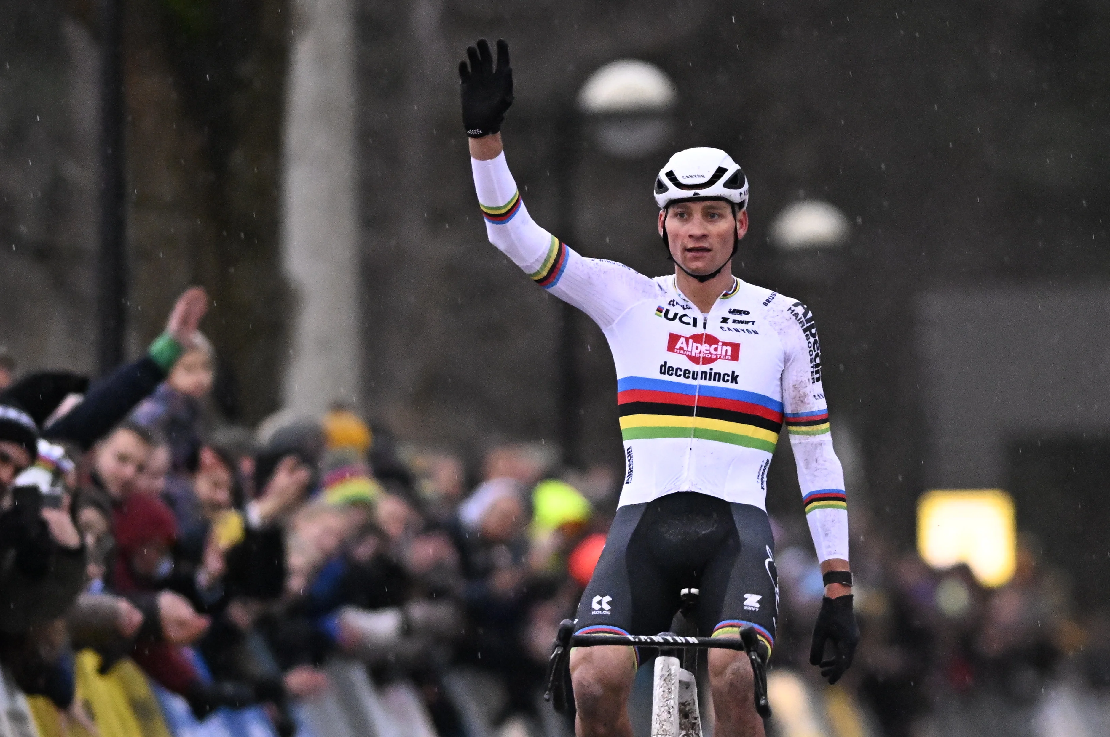 Dutch Mathieu Van Der Poel celebrates as he crosses the finish line to win the men's elite race of the superprestige cyclocross cycling event, race 5 out of 8, Monday 23 December 2024 in Mol. BELGA PHOTO JASPER JACOBS