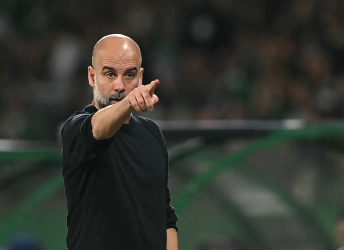 Manchester City's Spanish manager Pep Guardiola reacts on the touchline during the UEFA Champions League, league phase day 4 football match between Sporting Lisbon and Manchester City at the Jose Alvalade stadium in Lisbon on November 5, 2024.  PATRICIA DE MELO MOREIRA / AFP