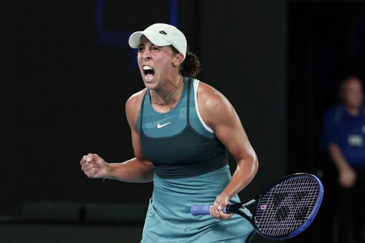 USA's Madison Keys reacts to a point against Poland's Iga Swiatek during their women's singles semi-final match on day twelve of the Australian Open tennis tournament in Melbourne on January 23, 2025.  DAVID GRAY / AFP