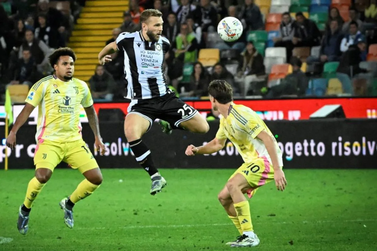 Udinese's Sweden's midfielder #25 Jesper Karlstrom (C) fights for the ball with Juventus' American midfielder #16 Weston McKennie (L) and Juventus' Turkish forward #15 Kenan Yildiz during the Italian Serie A football match between Udinese and Juventus at the Friuli Stadium in Udine, northeastern Italy, on November 2, 2024.  ANDREA PATTARO / AFP