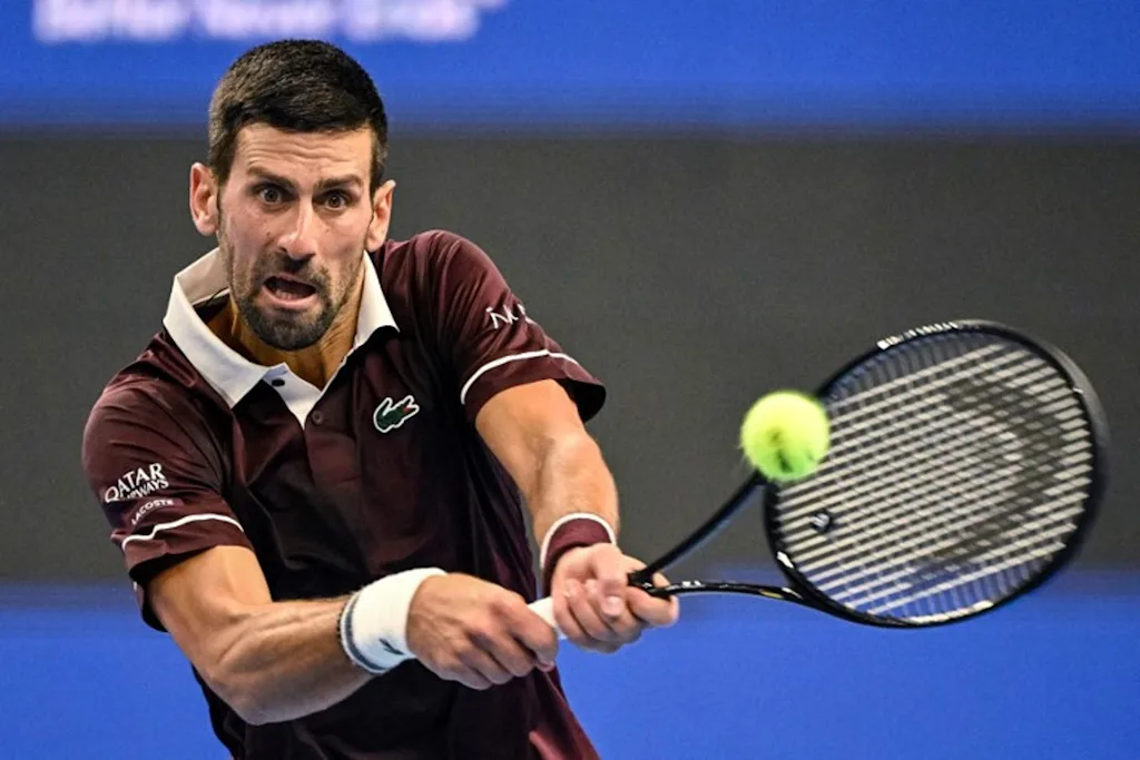 Serbia's Novak Djokovic hits a return to Australia's Alex de Minaur during the men's singles final at the China Open tennis tournament in Beijing on October 6, 2026 GREG BAKER / AFP
