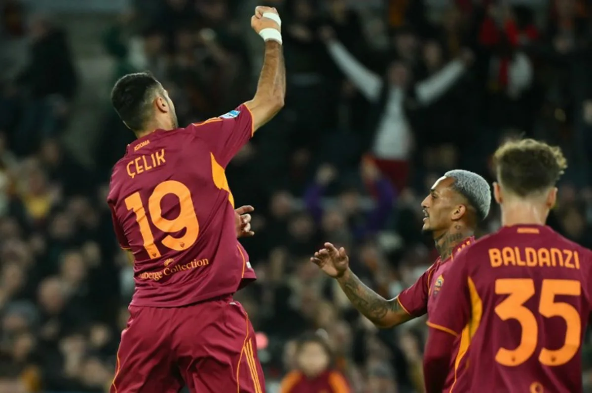 Roma's Turkish defender #19 Zeki Celik celebrates after scoring during the Italian Serie A football match between AS Roma and Udinese at the Olympic Stadium in Rome on November 9, 2025. Alberto PIZZOLI / AFP