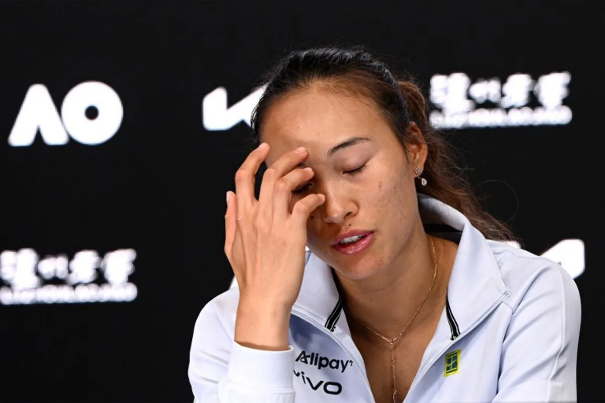 This hand out picture released by the Tennis Australia on January 15, 2025 shows China's Zheng Qinwen speaks at a press conference after her women's singles match against Germany's Laura Siegemund at the Australian Open tennis tournament in Melbourne.   Vince CALIGIURI / TENNIS AUSTRALIA / AFP