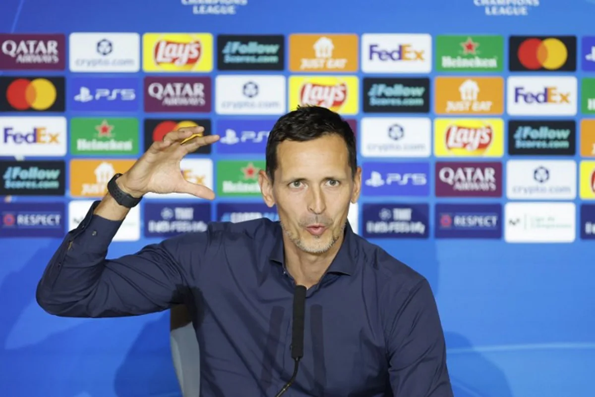 Eintracht Frankfurt's German coach Dino Toppmoller gives a press conference on the eve of the UEFA Champions League league phase day 2 football match between Club Atletico de Madrid and Eintracht Frankfurt at the Metropolitano stadium in Madrid on September 29, 2025. Oscar DEL POZO / AFP
