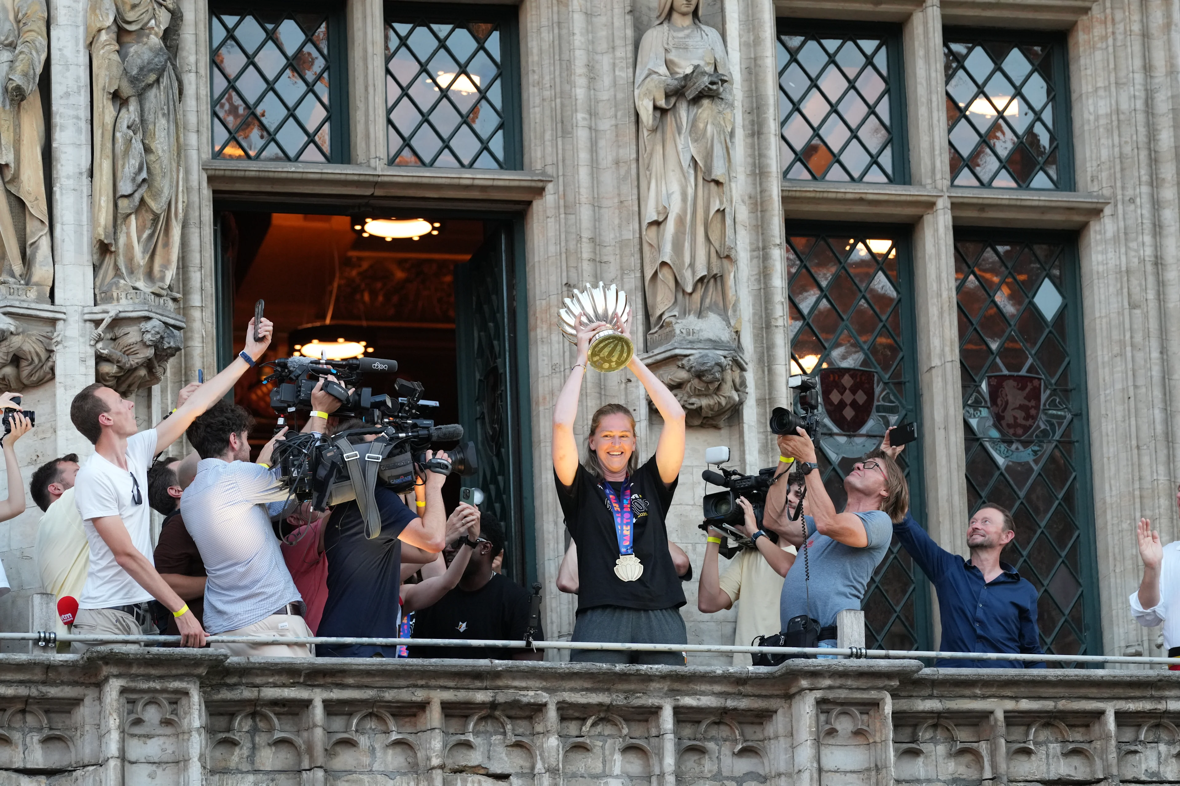 Belgium's captain Emma Meesseman carries the trophy at the celebrations at the Brussels city hall and Grand Place/ Grote Markt for Belgian national women basket team 'the Belgian Cats', after winning yesterday's European Championship final, Monday 30 June 2025. Yesterday the Cats successfully defended their European title, beating Spain in the final of the FIBA Women's EuroBasket 2025. BELGA PHOTO MARIUS BURGELMAN