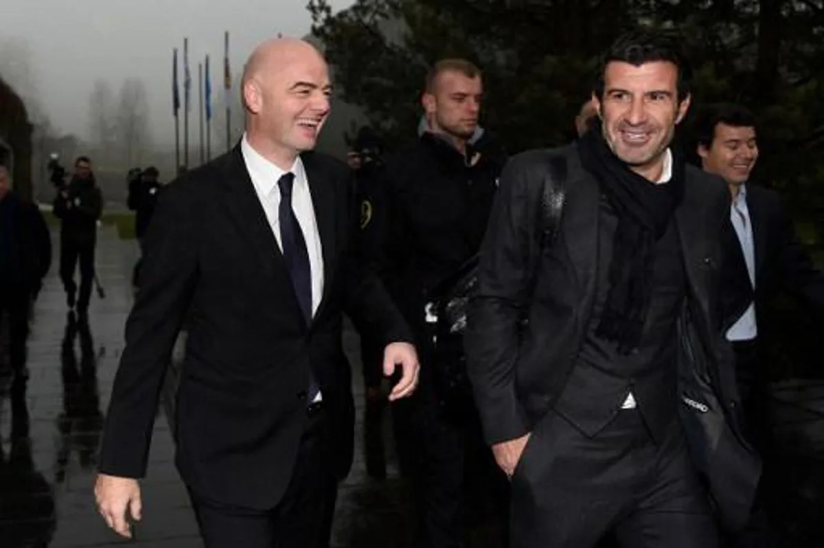 Newly-elected FIFA president Gianni Infantino (L) and former Portuguese international player Luis Figo (R) arrive at the FIFA headquarters on February 29, 2016 in Zurich.  Gianni Infantino insisted on February 28, 2016 that FIFA's reform package would close the door on a chapter of pain at world football's governing body and usher in an era of joy. / AFP / VALERIANO DI DOMENICO