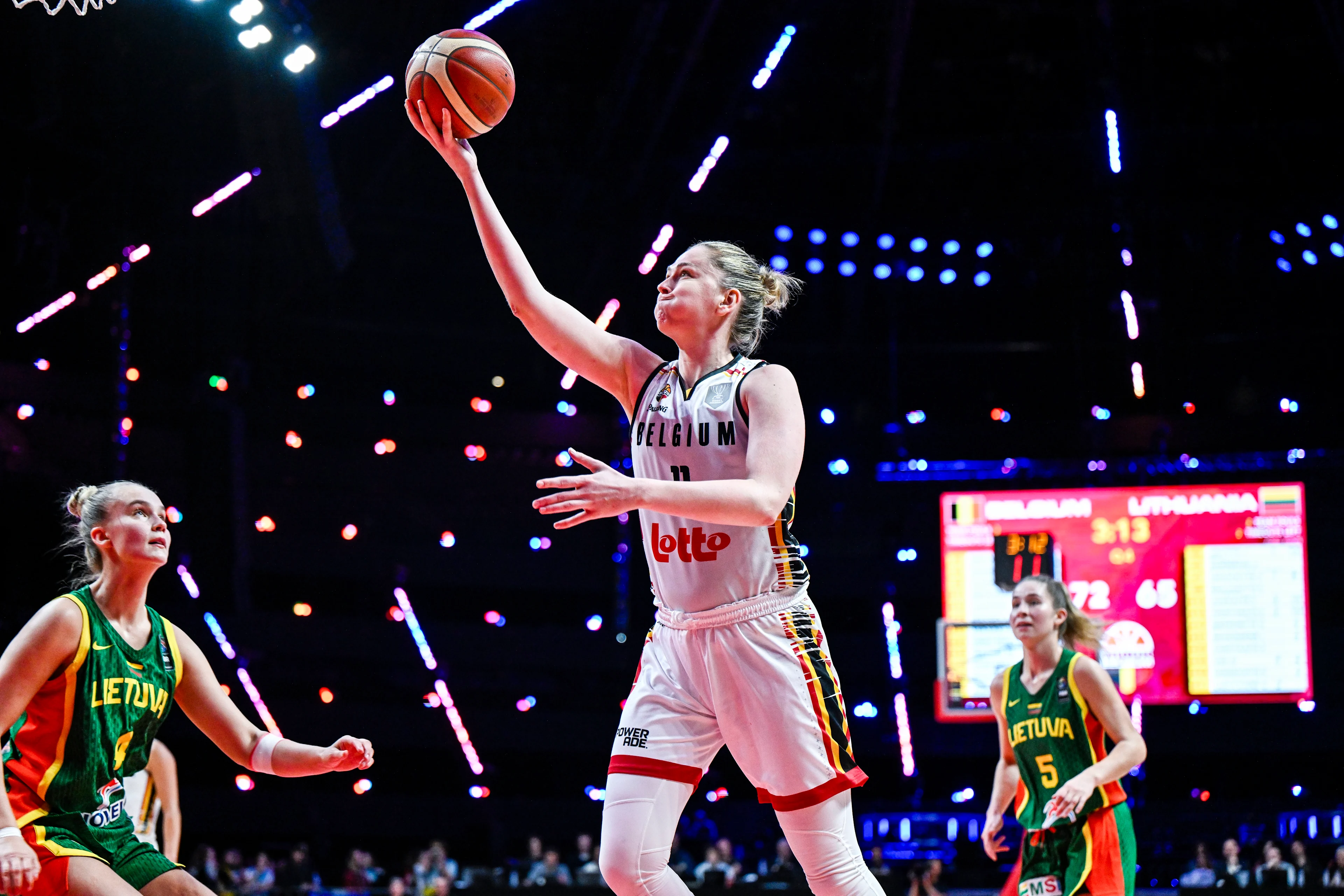 Lithuania's Juste Jocyte and Belgium's Emma Meesseman pictured in action during a basketball game between Belgian national team the Belgian Cats and Lithunia, a qualification game (3/6) for the 2025 Eurobasket tournament, on Thursday 07 November 2024 in Antwerp, Belgium. BELGA PHOTO TOM GOYVAERTS