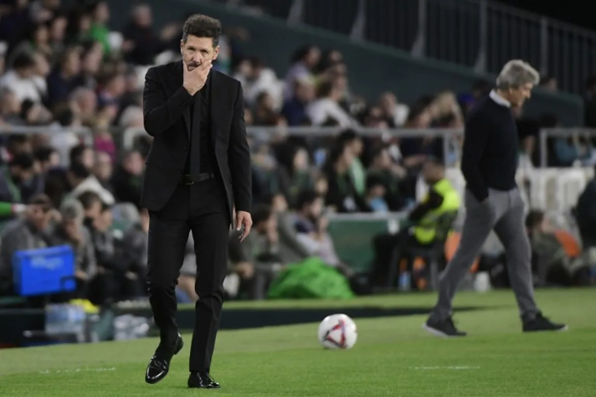 Atletico Madrid's Argentine coach Diego Simeone reacts during the Spanish league football match between Real Betis and Club Atletico de Madrid at the Benito Villamarin stadium in Seville on October 27, 2024.  CRISTINA QUICLER / AFP