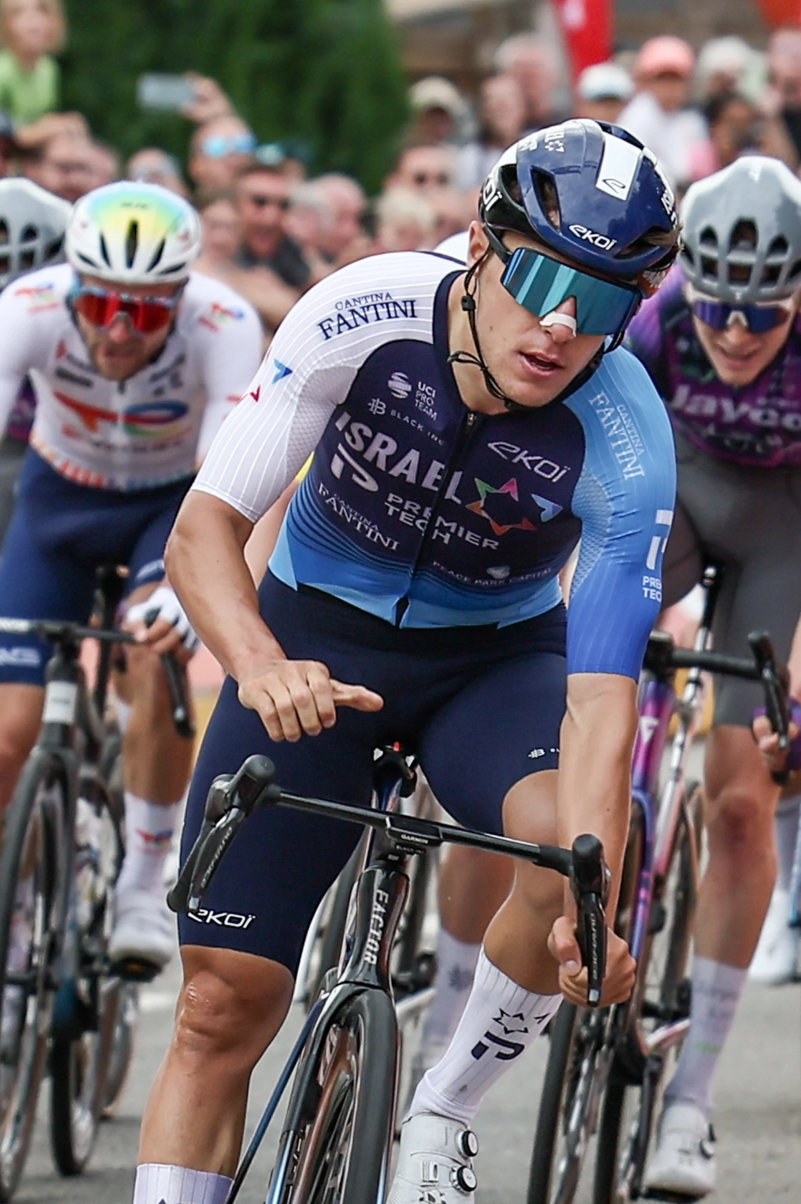 New Zealander Corbin John Strong of Israel-Premier Tech celebrates as he crosses the finish line to win the first stage of the Tour De Wallonie cycling race, from and back to Nassogne (182 km)on, Saturday 26 July 2025. BELGA PHOTO BRUNO FAHY