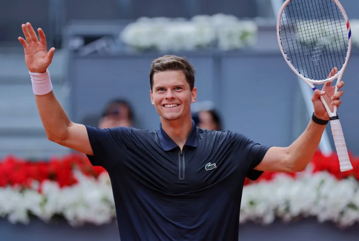 Belgium's Alexander Blockx celebrates beating Norway's Casper Ruud during their 2026 ATP Tour Madrid Open tennis tournament quarter-final singles match at the Caja Magica in Madrid, on April 30, 2026.  Thomas COEX / AFP