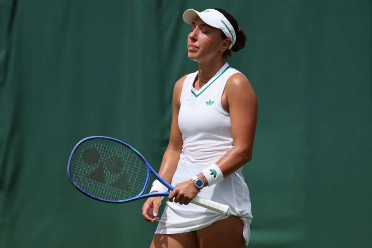 US player Jessica Pegula reacts as she plays against Italy's Elisabetta Cocciaretto during their women's singles first round tennis match on the second day of the 2025 Wimbledon Championships at The All England Lawn Tennis and Croquet Club in Wimbledon, southwest London, on July 1, 2025. Adrian Dennis / AFP