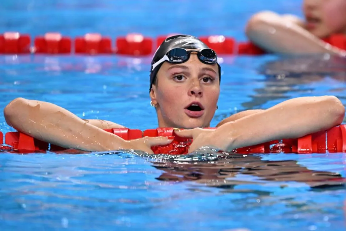 Canada's swimmer Summer Mcintosh reacts after a semi-final of the women's 200m butterfly swimming event during the 2025 World Aquatics Championships in Singapore on July 30, 2025. Oli SCARFF / AFP