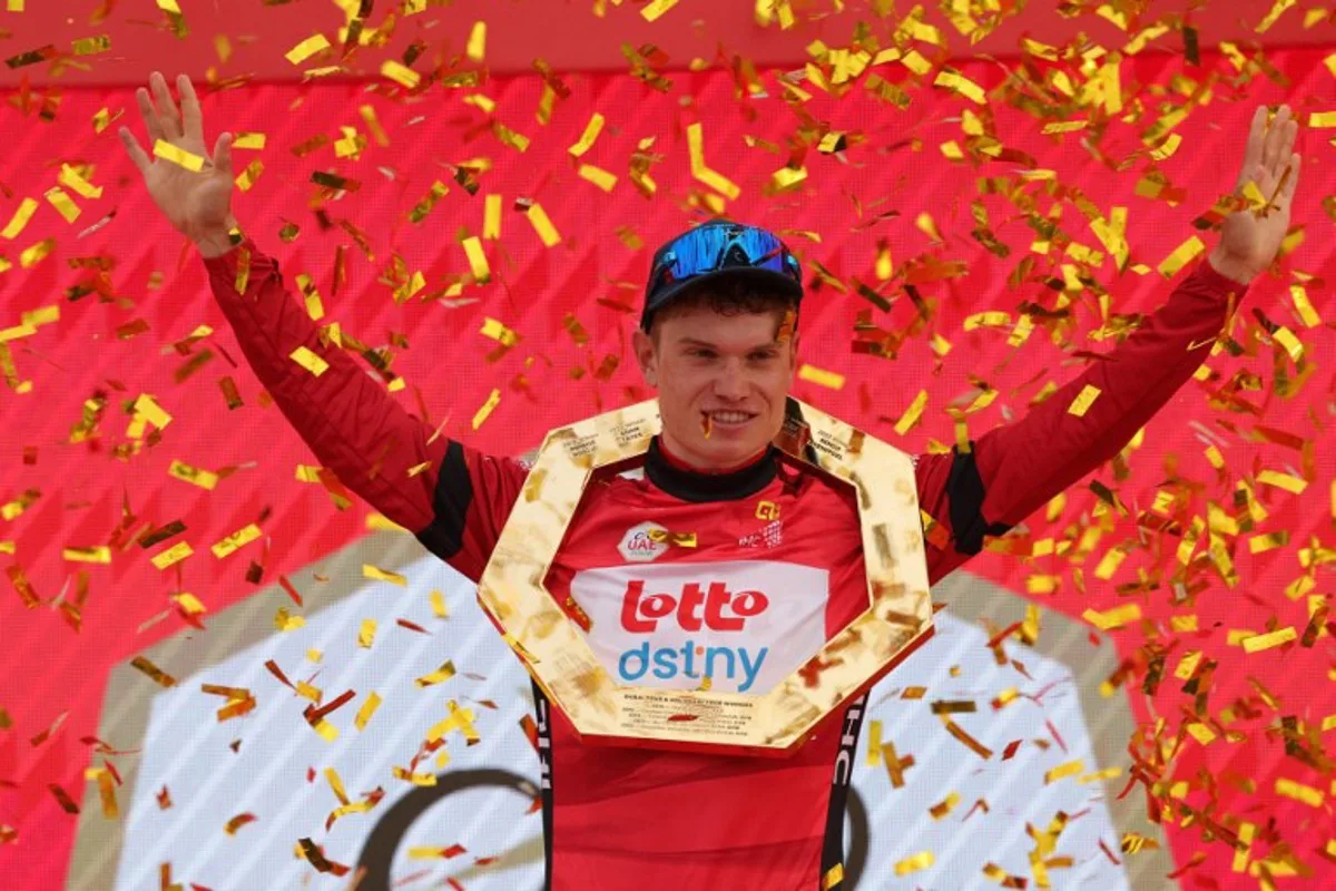 Lotto-DSTNY's Belgian cyclist Lennert Van Eetvelt celebrates after winning the race of the 6th UAE Cycling Tour on February 25, 2024.  Giuseppe CACACE / AFP