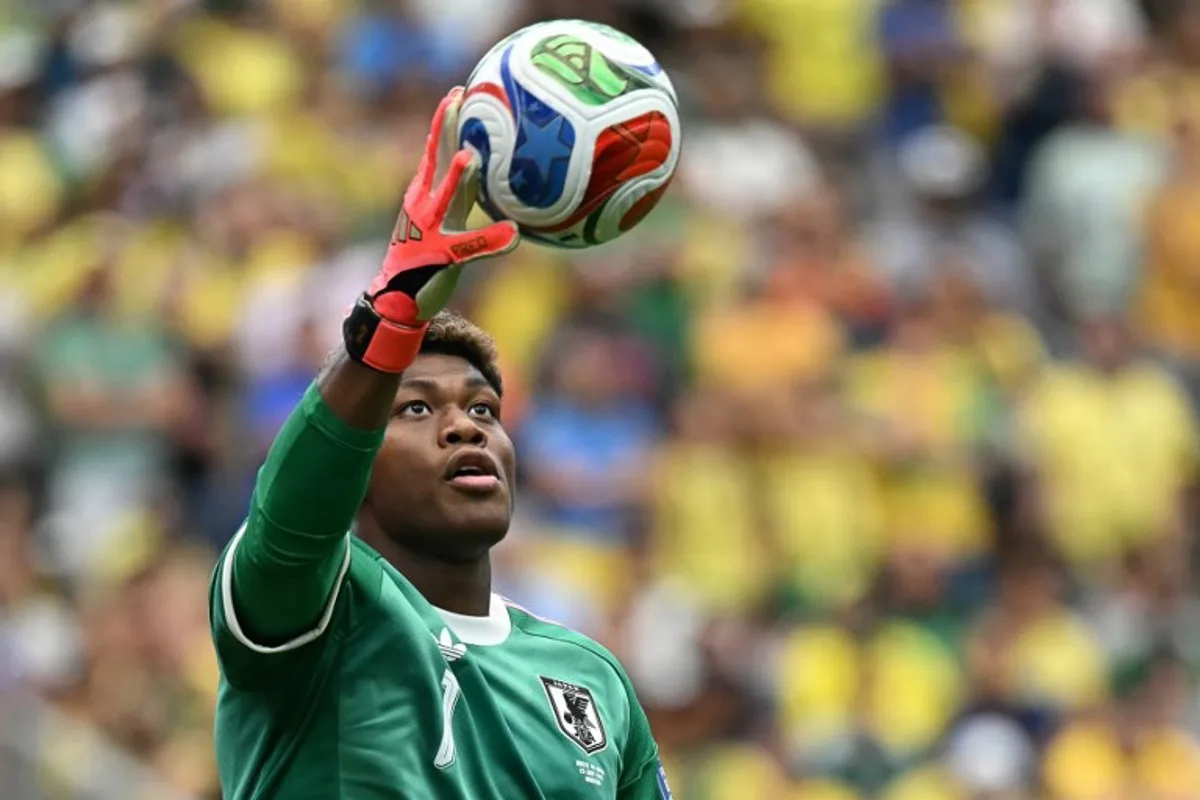 Japan's goalkeeper #01 Zion Suzuki catches the ball during the 2026 World Cup round of 32 football match between Brazil and Japan at the Houston Stadium in Houston on June 29, 2026. Paul ELLIS / AFP