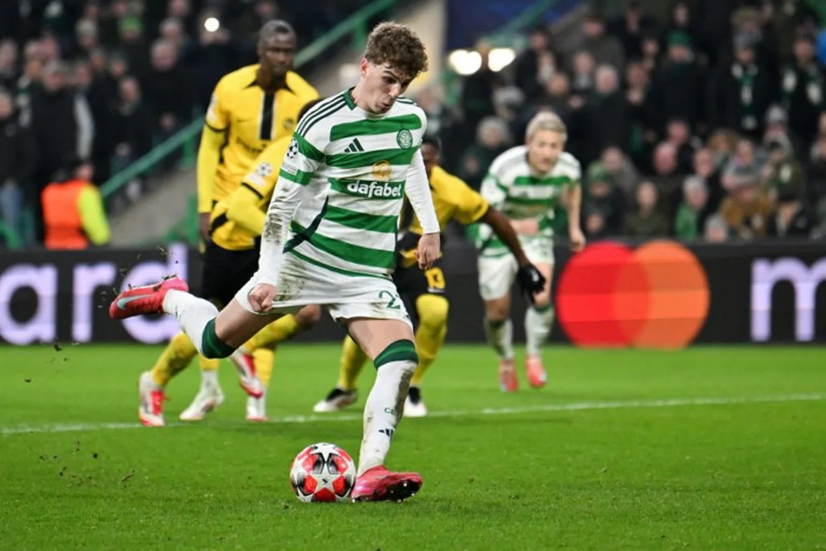 Celtic's Belgian midfielder #27 Arne Engels shoots from the penalty spot but fails to score during the UEFA Champions League football match between Celtic and Young Boys at Celtic Park stadium in Glasgow, Scotland on January 22, 2025.   ANDY BUCHANAN / AFP