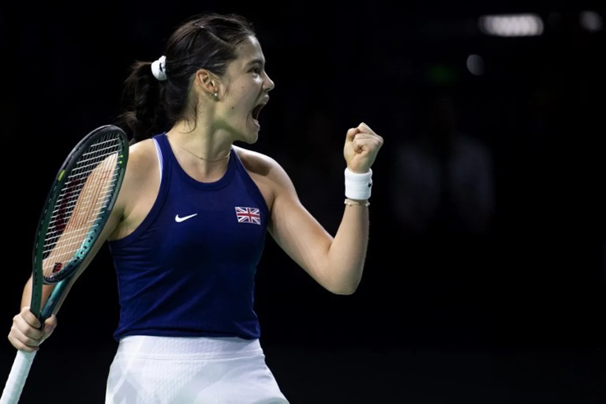 Britain's Emma Raducanu reacts as she plays against Canada's Rebecca Marino during their quarter-finals singles tennis match between Canada and Great Britain at the Billie Jean King Cup Finals at the Palacio de Deportes Jose Maria Martin Carpena in Malaga, southern Spain, on November 17, 2024.  JORGE GUERRERO / AFP