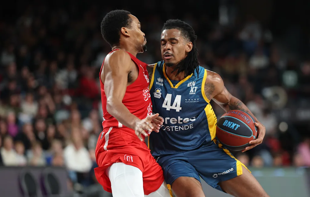 Spirou's Nigel Hawkins and Oostende's Adam Miller fight for the ball during a basketball match between Spirou Charleroi and BC Oostende, Friday 23 October 2026 in Charleroi, on day 4 of the 'BNXT League' Belgian and Dutch first division basket championship. BELGA PHOTO VIRGINIE LEFOUR