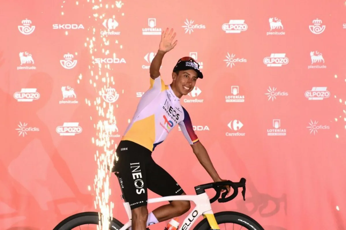 Team Ineos' Colombian rider Egan Bernal waves during the official teams presentation of the 80th edition of 'La Vuelta' cycling tour of Spain, in Torino, Italy on August 21, 2025. Marco BERTORELLO / AFP