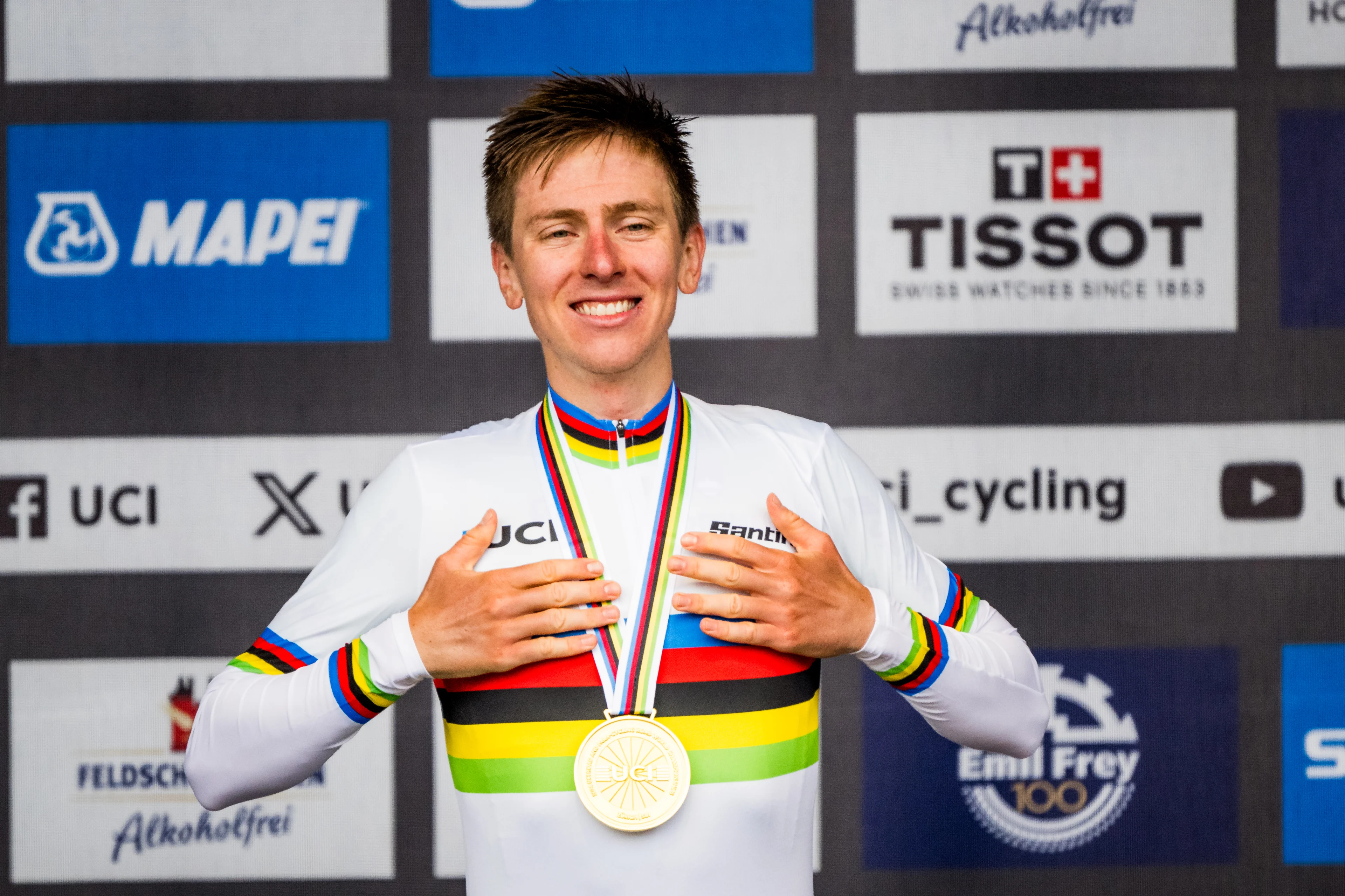 Slovenian Tadej Pogacar celebrates on the podium after winning the elite men road race at the 2024 UCI Road and Para-Cycling Road World Championships, Sunday 29 September 2024, in Zurich, Switzerland. The Worlds are taking place from 21 to 29 September. BELGA PHOTO JASPER JACOBS