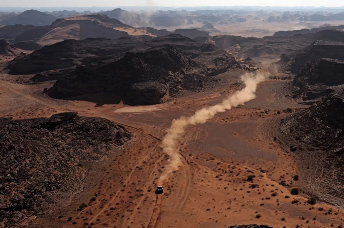 Pilots compete during stage 4 of the Dakar Rally 2025 between Al Henakiyak and Alula, on January 8, 2025.  Valery HACHE / AFP