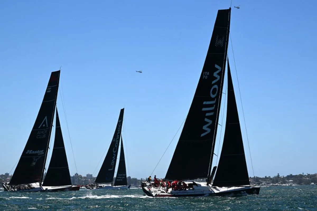 The yachts (L-R) Master Lock Commanche, LawConnect and Celestial V70  compete in the Sydney to Hobart yacht race from Sydney Harbour on December 26, 2024. Crews of more than 100 yachts set sail on December 26 on a "boat-breaking" Sydney-Hobart yacht race, with gale-force winds and high seas forecast for the gruelling bluewater classic. Saeed KHAN / AFP