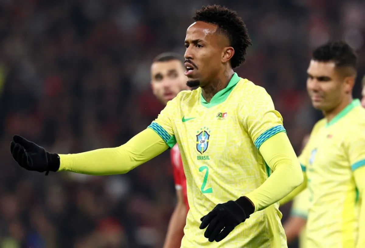 Brazil's midfielder #02 Eder Militao reacts during the International friendly football match between Brazil and Tunisia at Stade Pierre-Mauroy, in Villeneuve-d'Ascq, northern France, on November 18, 2025. FRANCK FIFE / AFP