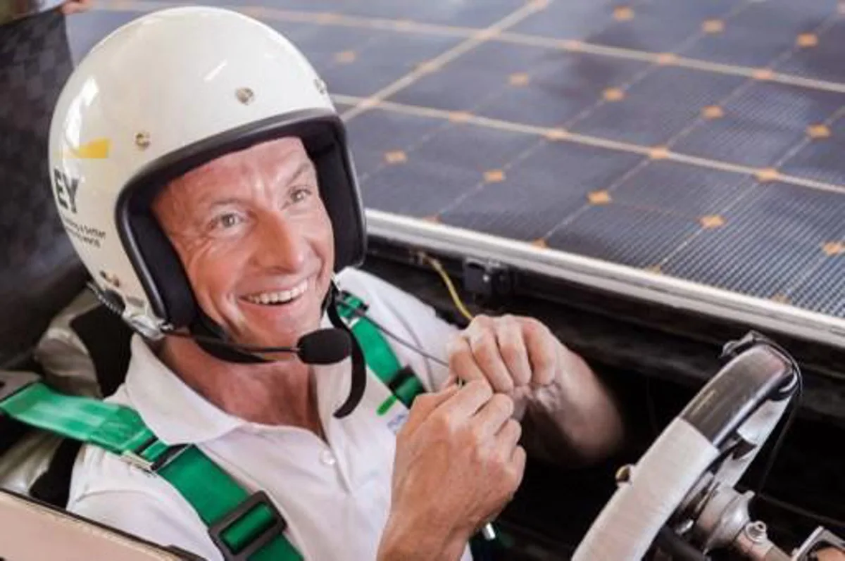 This handout photo taken on October 17, 2015 and received from Punch Powertrain Solar Team on October 18 shows driver Bert Longin smiling after the qualification lap for the 2015 Bridgestone World Solar Challenge at the Hidden Valley race track in Darwin. The team of 16 University of Leuven students clocked the fourth time during qualifications and will October 18 start their 3000 kilometer race from Darwin to Adelaide with 44 other solar cars from 25 different countries.  AFP PHOTO / PUNCH POWERTRAIN SOLAR TEAM / Sarah Somers  -- RESTRICTED TO EDITORIAL USE - MANDATORY CREDIT AFP PHOTO / PUNCH POWERTRAIN SOLAR TEAM / Sarah Somers - NO MARKETING NO ADVERTISING CAMPAIGNS - DISTRIBUTED AS A SERVICE TO CLIENTS -- -- RESTRICTED TO EDITORIAL USE - MANDATORY CREDIT AFP PHOTO / PUNCH POWERTRAIN SOLAR TEAM / Sarah Somers - NO MARKETING NO ADVERTISING CAMPAIGNS - DISTRIBUTED AS A SERVICE TO CLIENTS --

