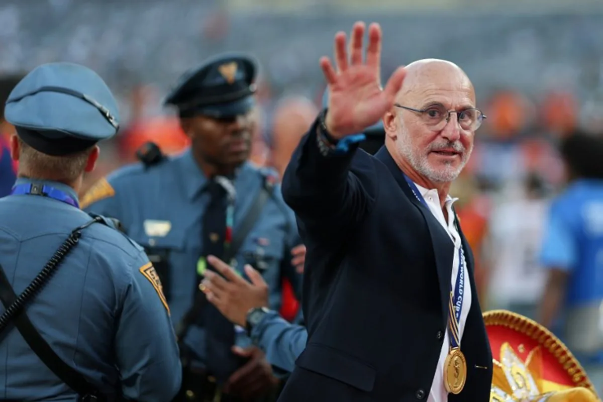 Spain's head coach Luis de la Fuente waves after winning the 2026 World Cup football tournament final match between Spain and Argentina at the New York/New Jersey Stadium in East Rutherford on July 19, 2026. PATRICIA DE MELO MOREIRA / AFP