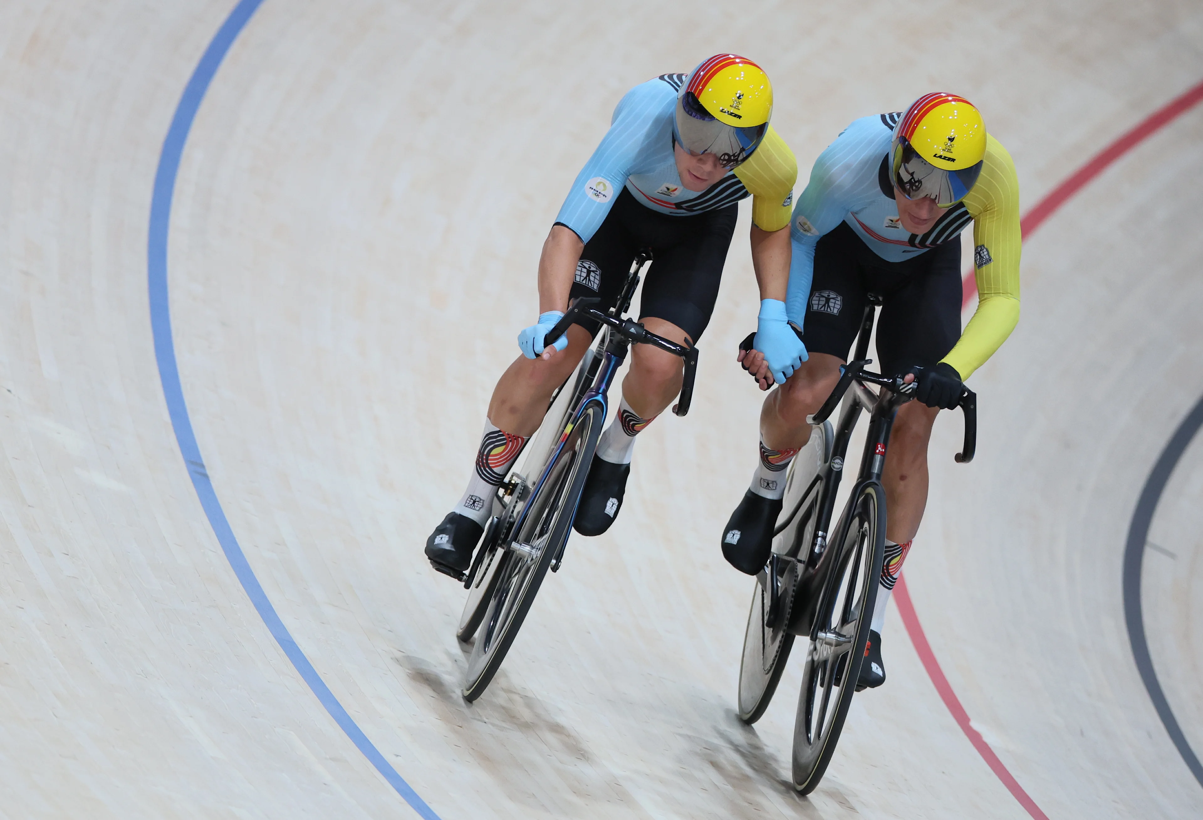 Belgian cyclist Fabio Van den Bossche and Belgian cyclist Lindsay De Vylder pictured in action during pictured on the podium ceremony of the women's heptathlon at the athletics competition at the Paris 2024 Olympic Games, on Saturday 10 August 2024 in Paris, France. The Games of the XXXIII Olympiad are taking place in Paris from 26 July to 11 August. The Belgian delegation counts 165 athletes competing in 21 sports. BELGA PHOTO JASPER JACOBS