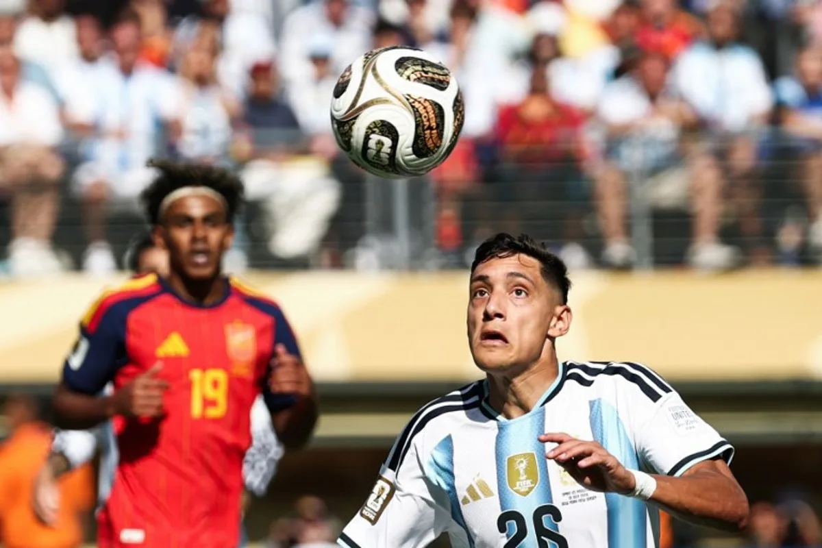 Argentina's defender #26 Nahuel Molina looks at the ball during the 2026 World Cup football tournament final match between Spain and Argentina at the New York/New Jersey Stadium in East Rutherford on July 19, 2026. FRANCK FIFE / AFP