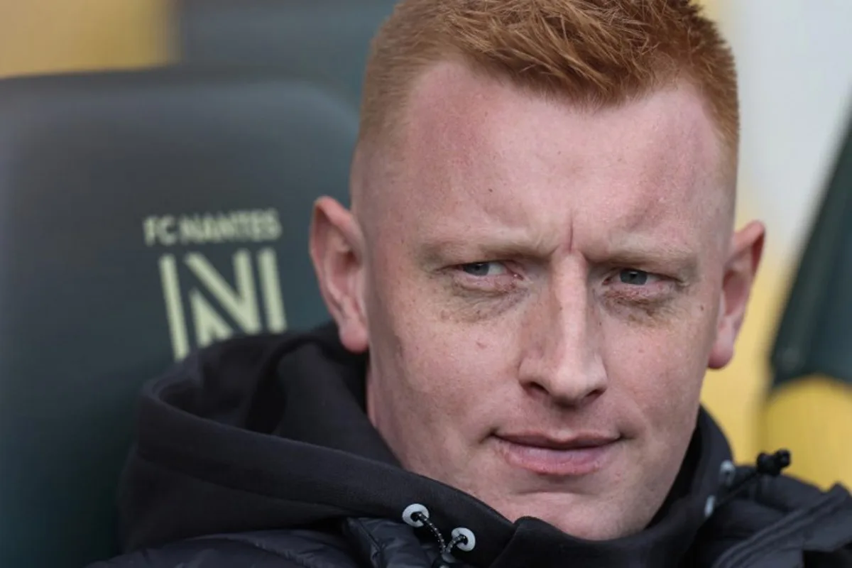 Lens' Belgian head coach Will Still looks on ahead of the French L1 football match between FC Nantes and RC Lens at the Stade de la Beaujoire-Louis Fonteneau in Nantes, western France on February 23, 2025.  FRED TANNEAU / AFP