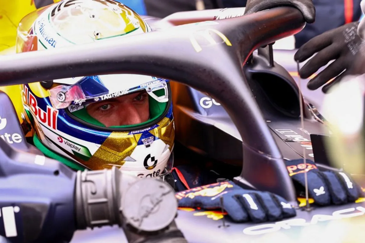 Red Bull Racing's Dutch driver Max Verstappen makes a pit stop during the sprint race of the Sao Paulo Formula One Grand Prix at the Jose Carlos Pace racetrack, aka Interlagos, in Sao Paulo, Brazil on November 8, 2025. JEAN CARNIEL / POOL / AFP