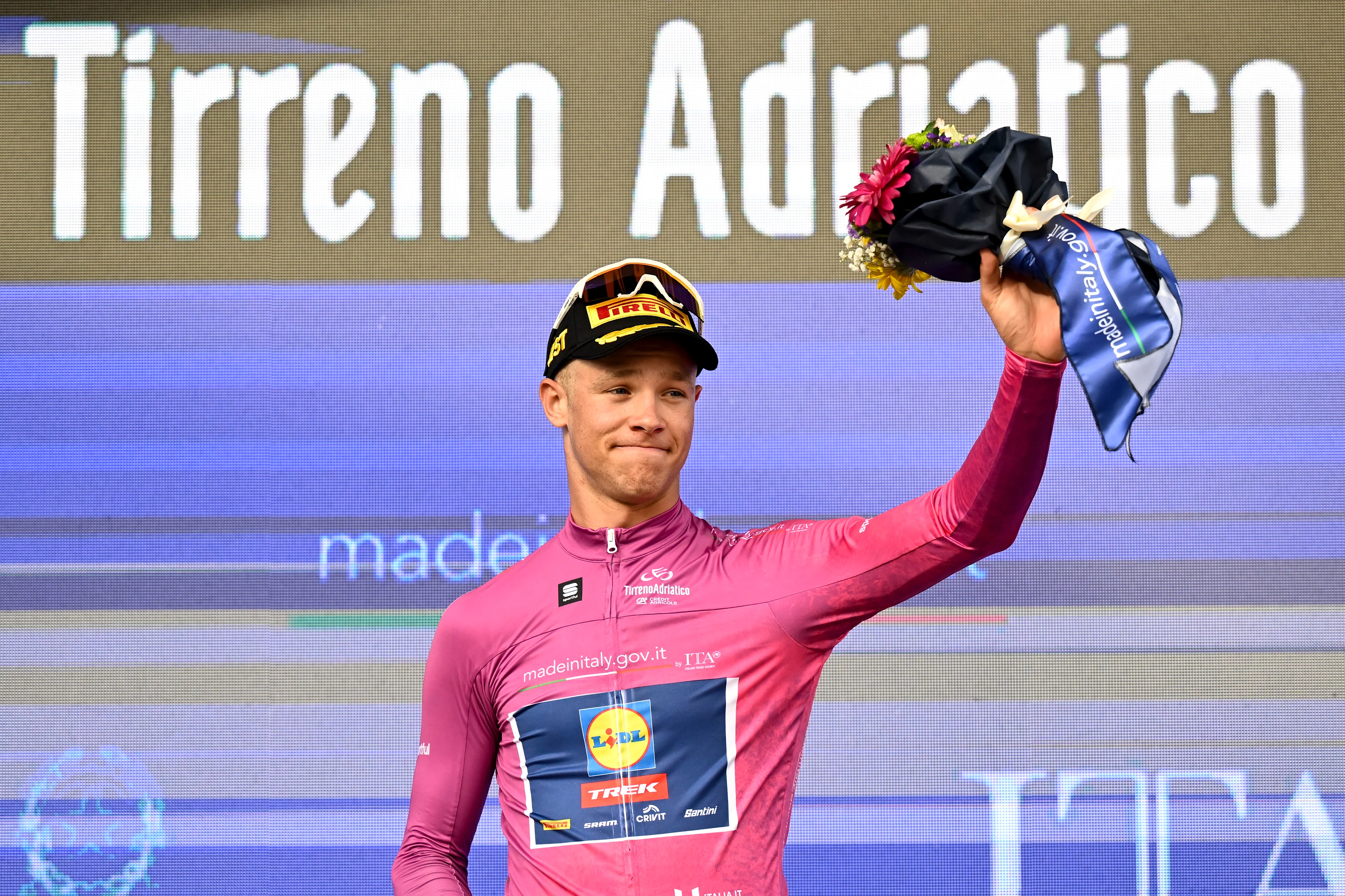 Italian Jonathan Milan of Lidl-Trek wearing the pink jersey of leader in the sprint ranking after the second stage of the Tirreno-Adriatico cycling race, a 189km race from Camaiore to Follonica, Italy, Tuesday 11 March 2025. BELGA PHOTO DIRK WAEM