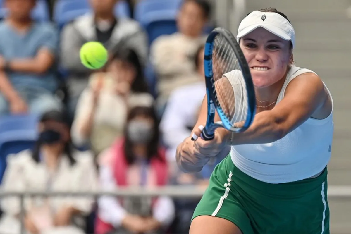 USA's Sofia Kenin hits a return to Britain's Katie Boulter during their women's singles semifinal match on day six of the Pan Pacific Open tennis tournament in Tokyo on October 26, 2024.  Richard A. Brooks / AFP