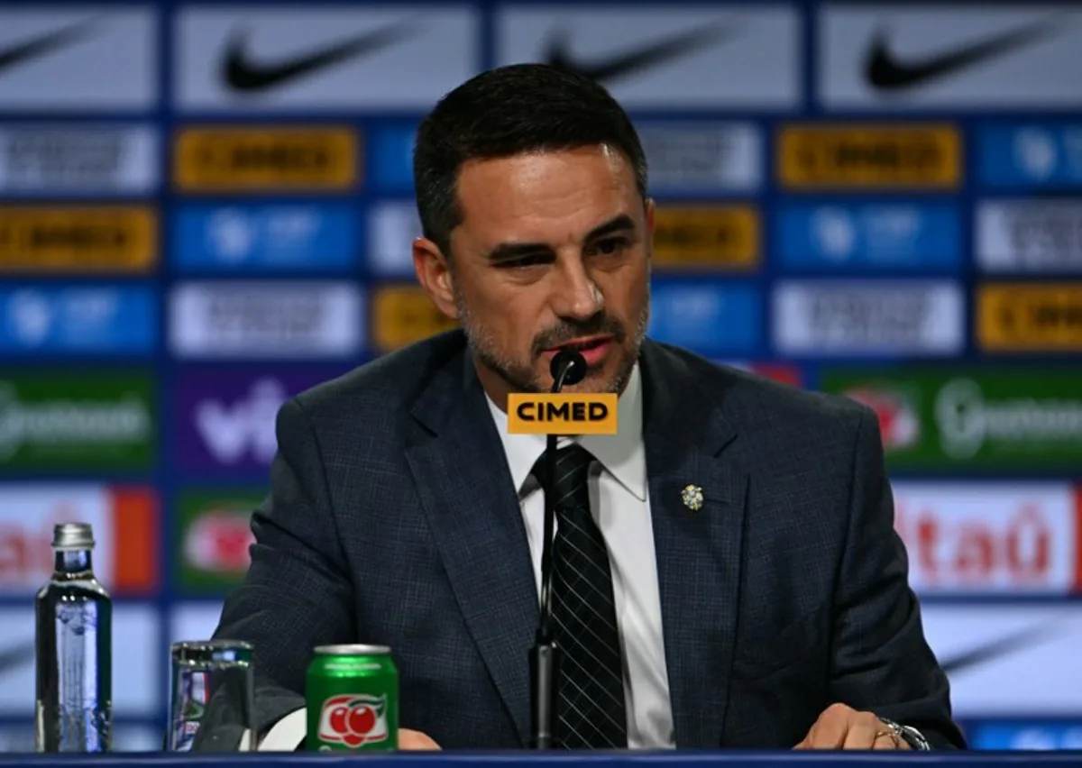 The president of the Brazilian Football Confederation (CBF) Samir Xaud speaks during the presentation of Brazil's football team new head coach, Italian Carlo Ancelotti (out of frame), at a hotel in Barra da Tijuca neighbourhood, Rio de Janeiro, Brazil, on May 26, 2025. Mauro PIMENTEL / AFP