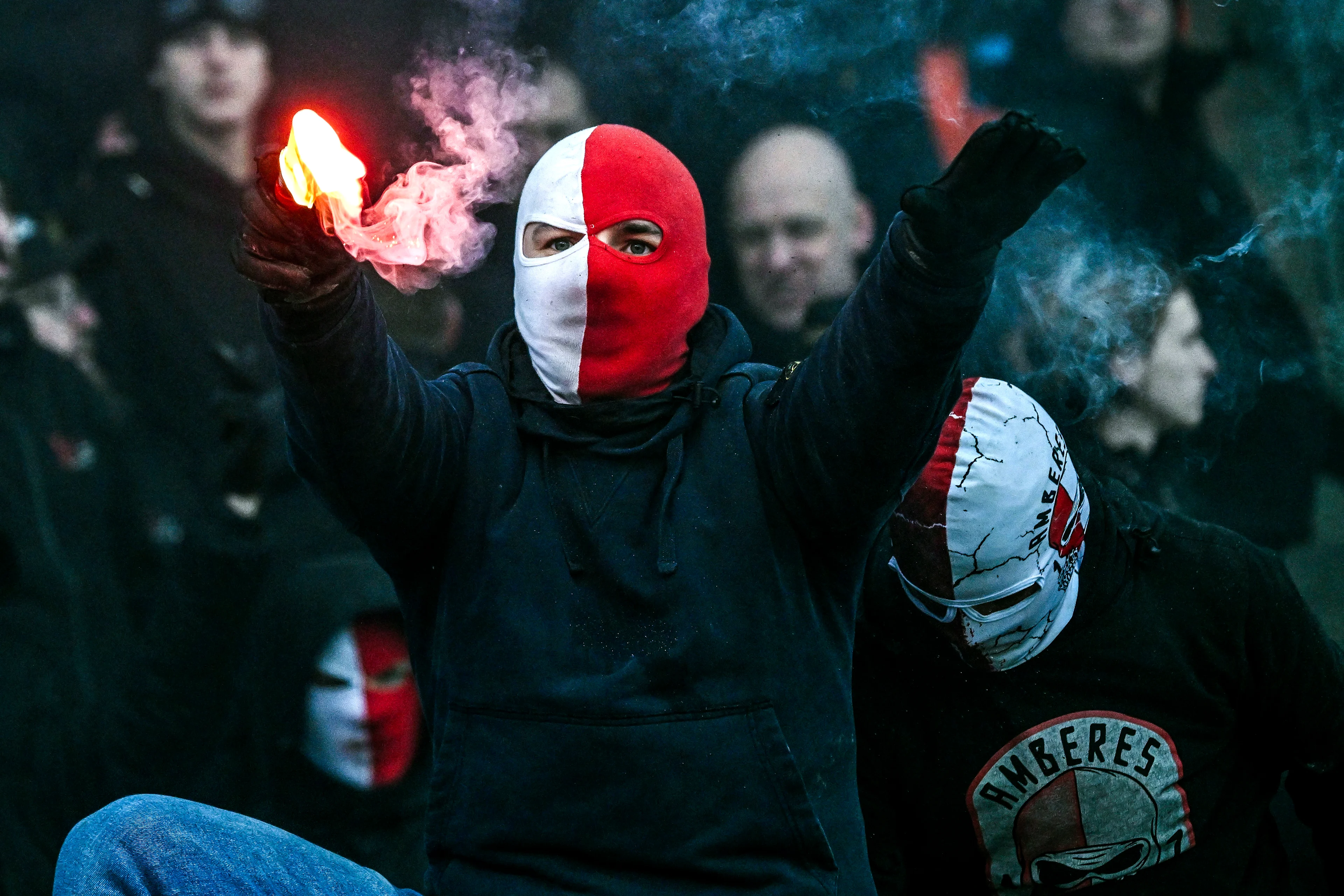 Antwerp FC supporters with fireworks pictured during a soccer game between Beerschot VA and Royal Antwerp FC, Sunday 12 January 2025 in Antwerp, on day 21 of the 2024-2025 season of 'Jupiler Pro League' first division of the Belgian championship. BELGA PHOTO TOM GOYVAERTS