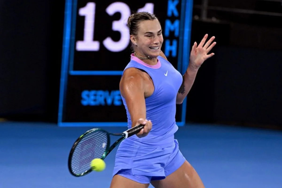 Belarus' Aryna Sabalenka hits a return to Russia's Mirra Andreeva during their women's singles semi-final match at the Brisbane International tennis tournament in Brisbane on January 4, 2025.  William WEST / AFP