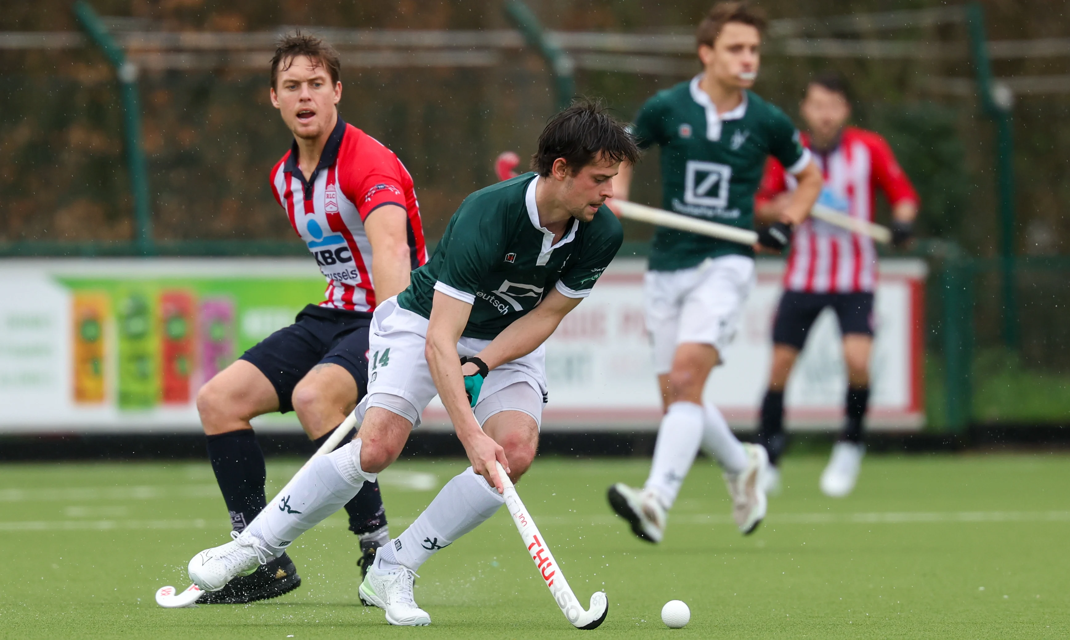 Leopold's Tom Boon and Watduck's Tommy Willems fight for the ball during a hockey game between Royal Leopold Club and Waterloo Ducks HC, Sunday 17 March 2024, in Uccle / Ukkel, Brussels, on day 17 of the Belgian first division hockey championship. BELGA PHOTO VIRGINIE LEFOUR