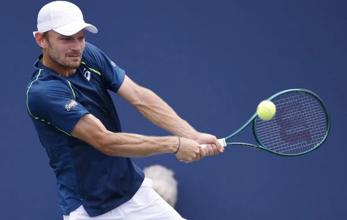 Belgium's David Goffin hits a return to Czech Republic's Tomas Machac during their men's singles third round match on day six of the US Open tennis tournament at the USTA Billie Jean King National Tennis Center in New York City, on August 31, 2024.  Kena Betancur / AFP