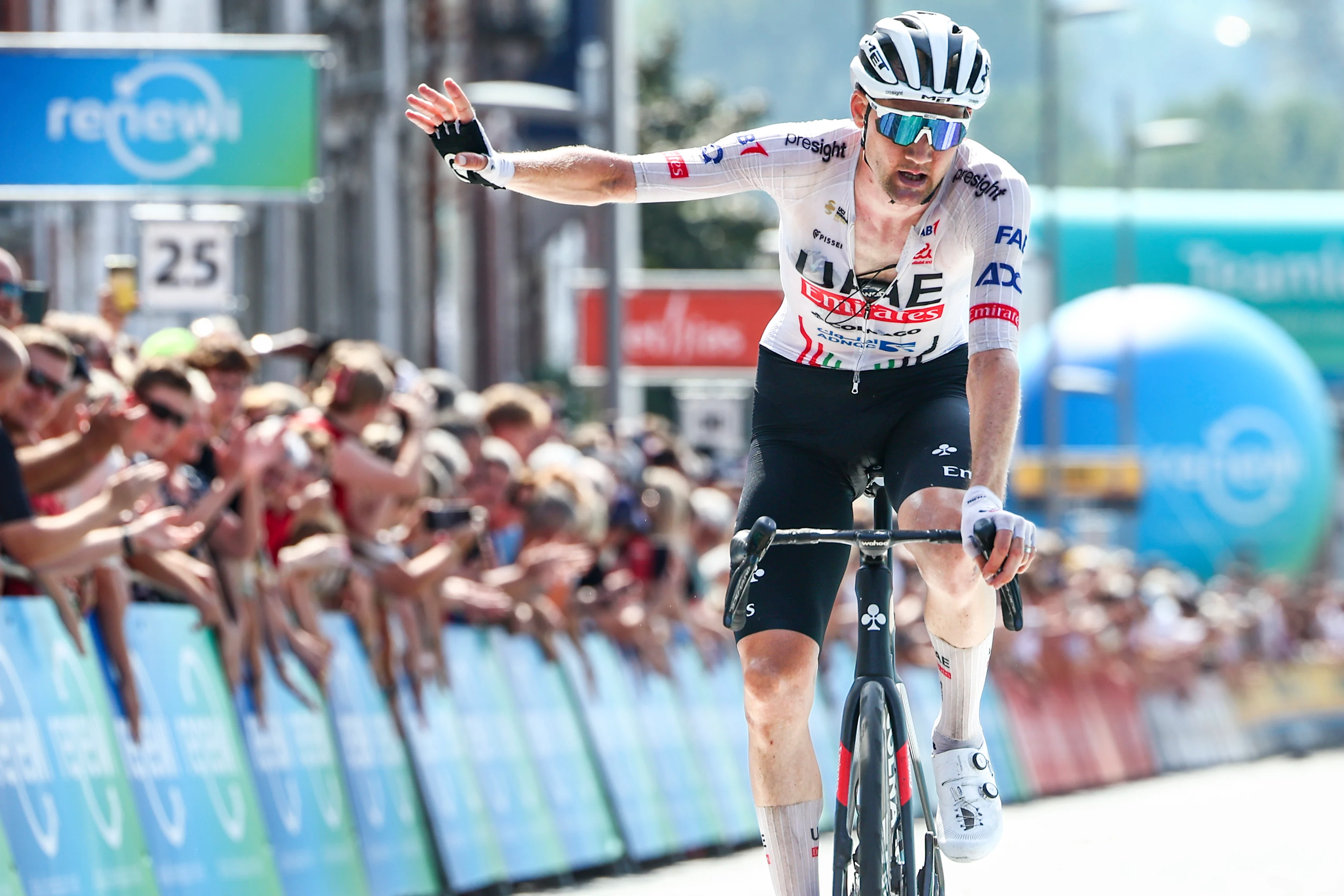 Belgian Tim Wellens of UAE Team Emirates crosses the finish line of the fifth and last stage of the 'Renewi Tour' multi-stage cycling race, from Menen to Geraardsbergen (202,5 km) on Sunday 01 September 2024. The five-day race takes place in Belgium and the Netherlands. BELGA PHOTO DAVID PINTENS