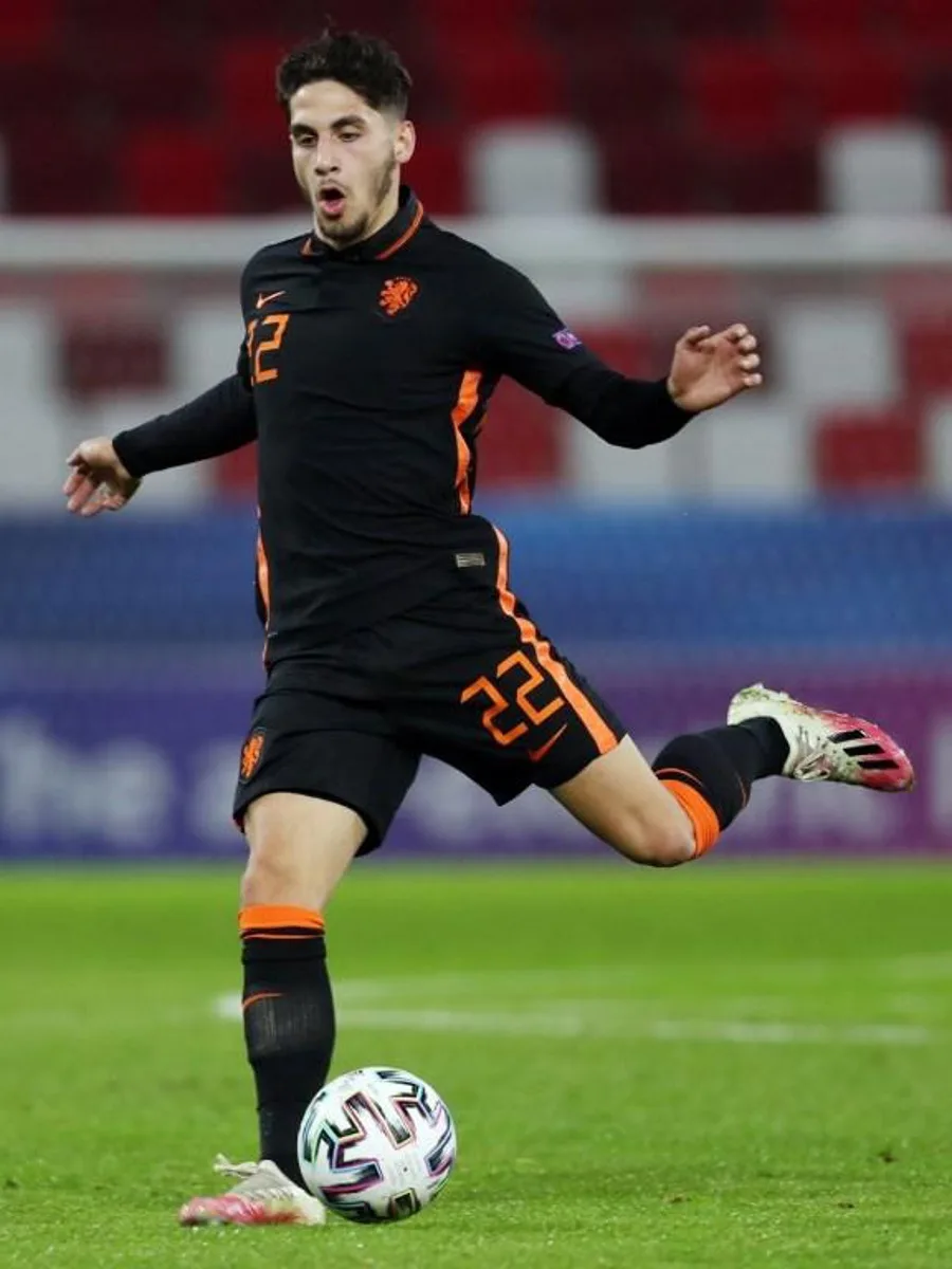 Netherland's midfielder Ludovit Reis plays the ball during the UEFA Under21 Championship group stage football match Romania v the Netherlands at the Bozsik Arena in Budapest on March 24, 2021. FERENC ISZA / AFP