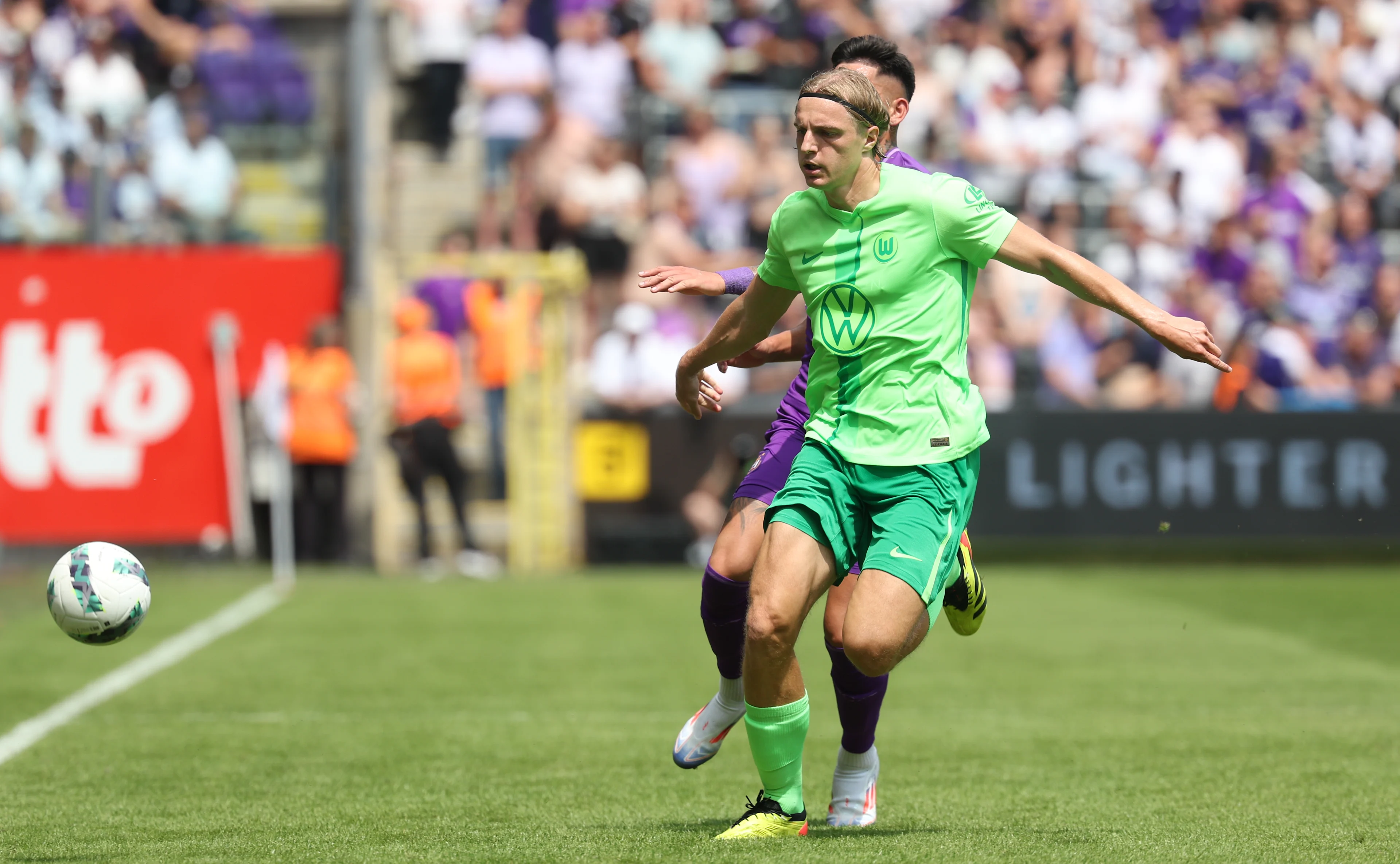 Anderlecht's Luis Vazquez and Wolfsburg's Sebastiaan Bornauw fight for the ball during the gala match between Belgian soccer team RSC Anderlecht and German team VfL Wolfsburg, in Brussels, Saturday 20 July 2024, in preparation of the upcoming 2024-2025 season of the Jupiler Pro League first division. BELGA PHOTO VIRGINIE LEFOUR