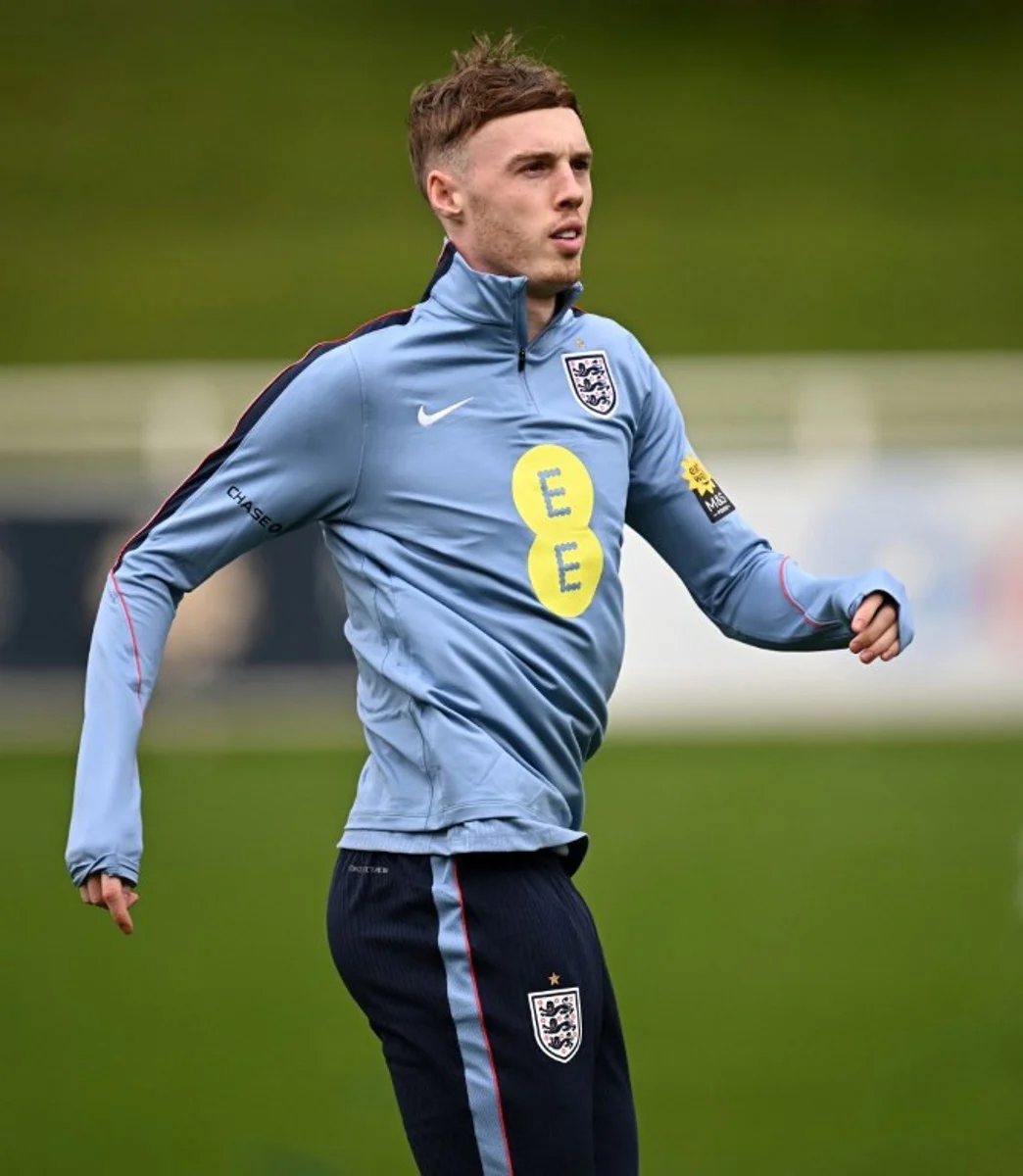 England's midfielder Cole Palmer takes part in a training session at St George's Park in Burton-upon-Trent, central England, on March 24, 2025, ahead of their international friendly football matches against Uruguay and Japan. Paul ELLIS / AFP