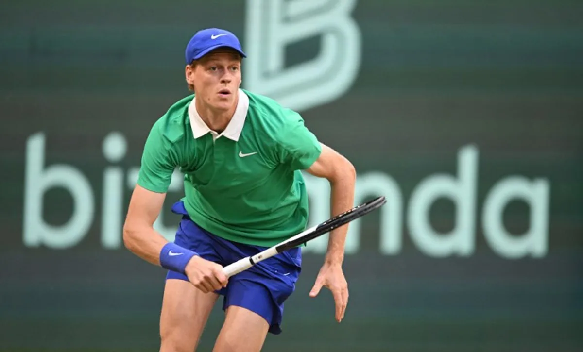 Kazakhstan's Alexander Bublik eyes the ball to Italy's Jannik Sinner in their men's singles tennis match during the Halle Open ATP tennis tournament in Halle, on June 19, 2025. CARMEN JASPERSEN / AFP