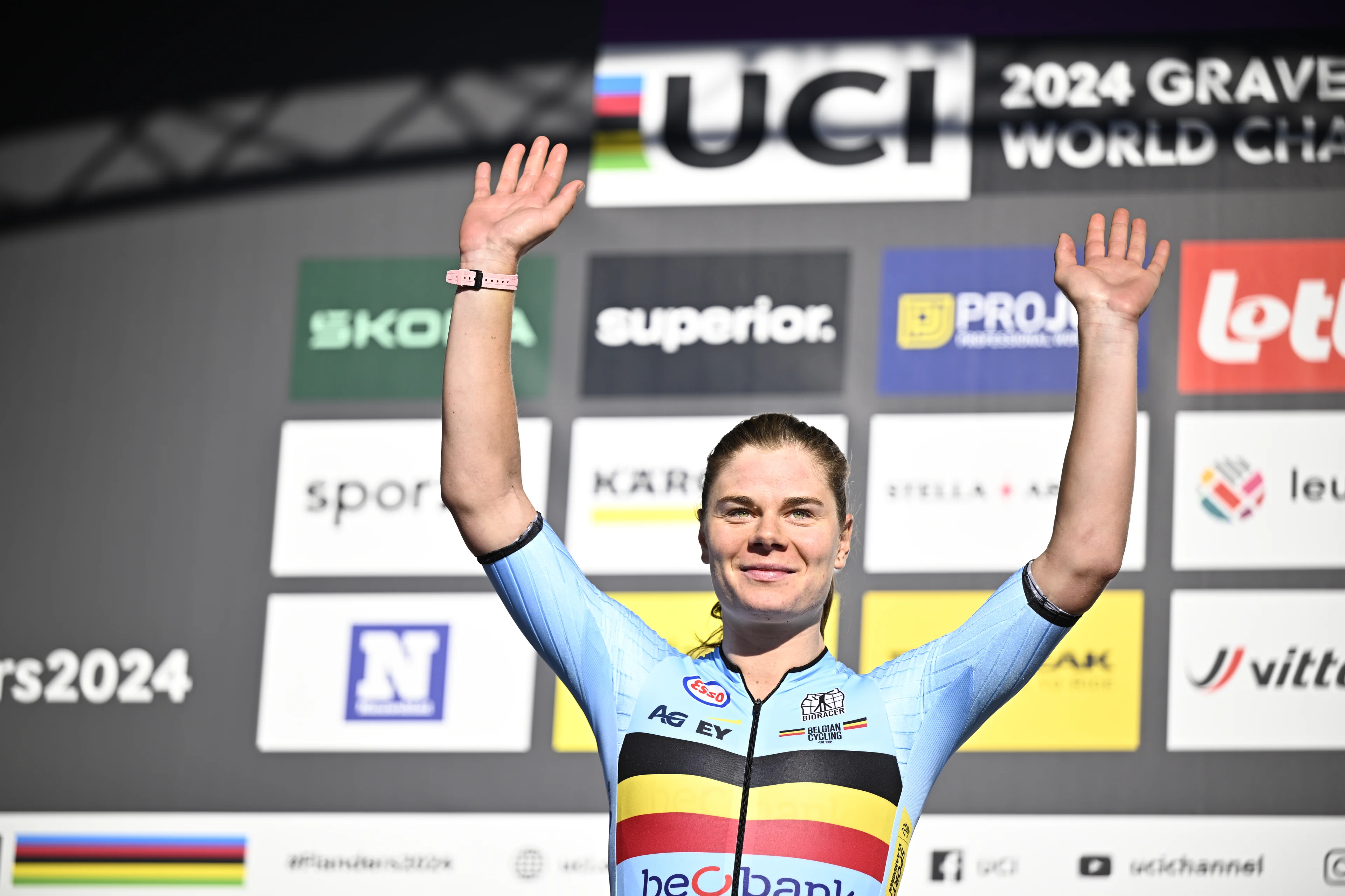 Second placed Belgian Lotte Kopecky celebrates on the podium after the women elite race at the UCI World Gravel Championships, Saturday 05 October 2024, in Leuven. BELGA PHOTO JASPER JACOBS