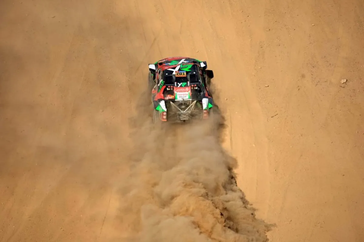 Saudi driver Yazeed Al Rajhi and co driver Timo Gottschalk compete in Stage 1 of the Dakar Rally 2025, between Bisha and Bisha, Saudi Arabia, on January 4, 2025.  Valery HACHE / AFP